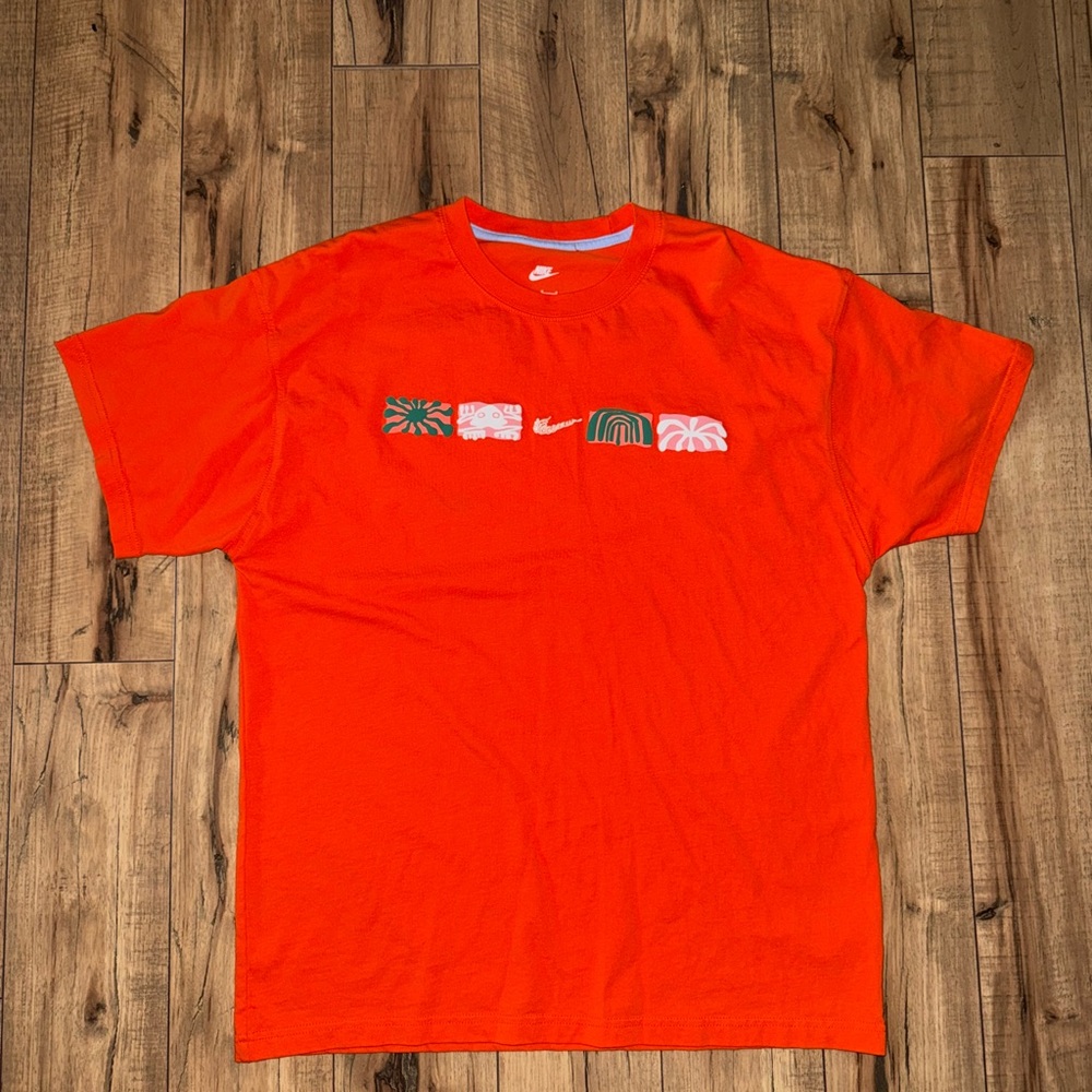 Orange Nike tee